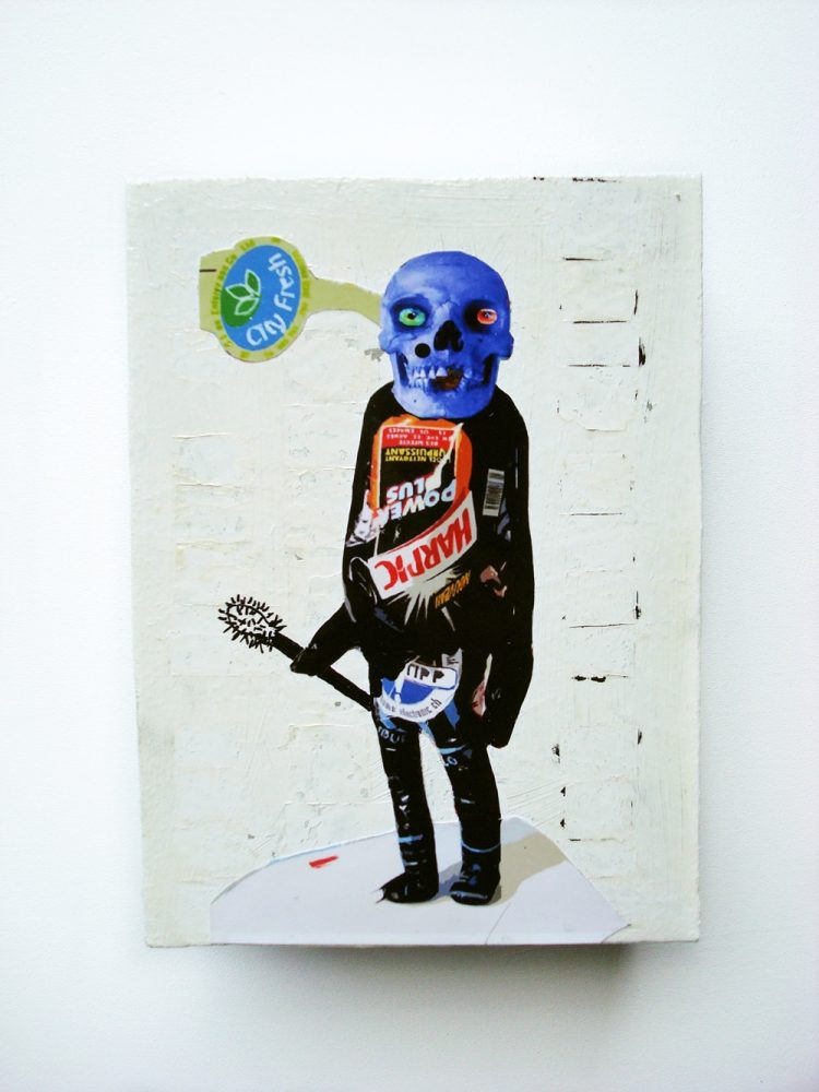 Collage figure on a wooden box, made from a cleaning-product bottle with a blue skull-like head and holding a Merdolino toilet brush.