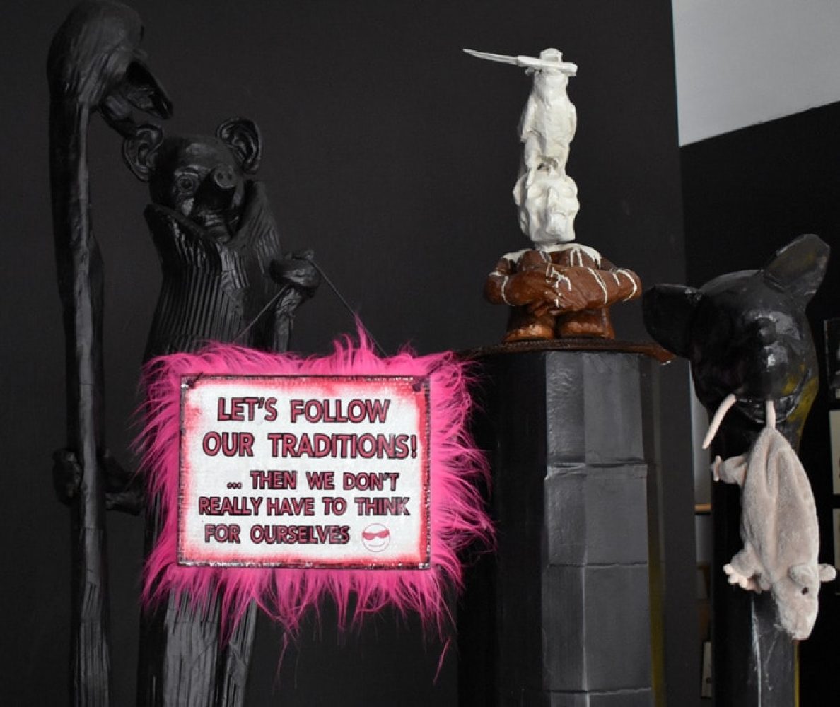 Installation view with a pink text work and Justification at Sweet Bunny Cute Bunny, Basel.
