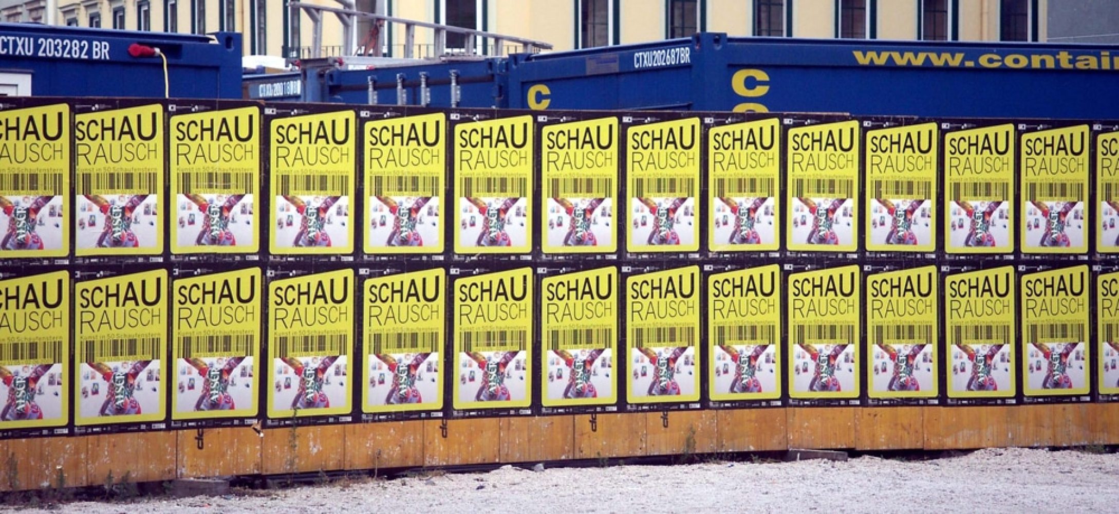 Wall of repeated Schaurausch posters displayed outside the cultural centre in Linz.