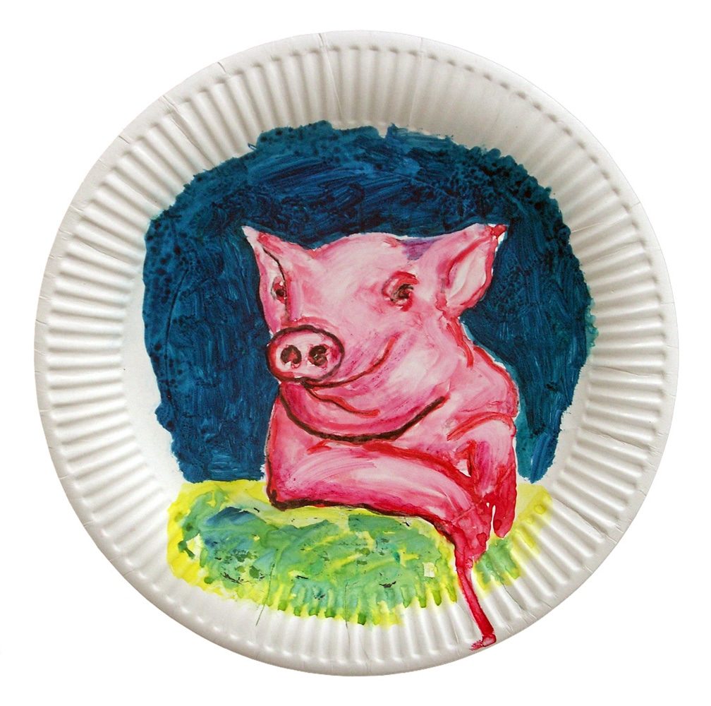 Watercolour of a seated figure with the words “Create Yourself” on a paper plate.