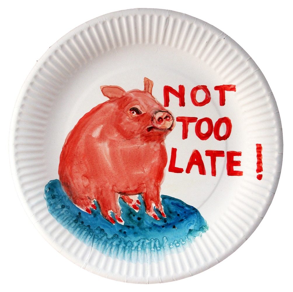 Watercolour of a red animal-like figure with the words “Not Too Late!” on a paper plate.